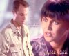 Hybrid Kisses cover.  Adam Baldwin as Knowle Rohrer, Lucy Lawless as Shannon McMahon.